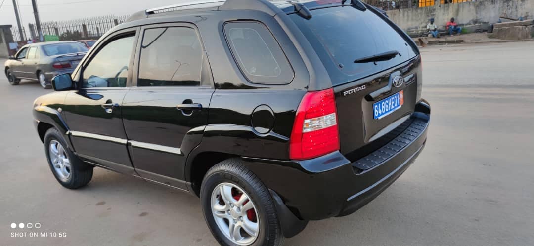 KIA SPORTAGE — photo 2