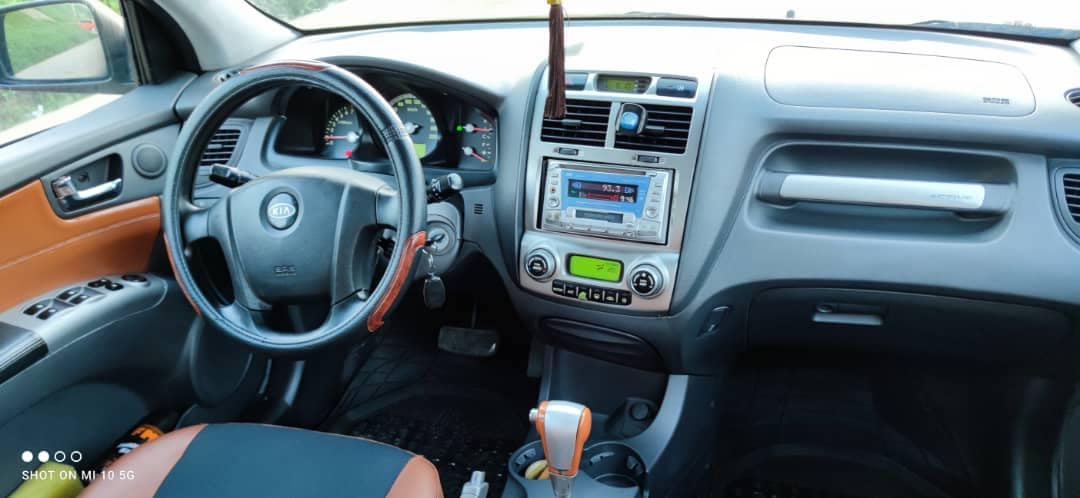 KIA SPORTAGE — photo 3